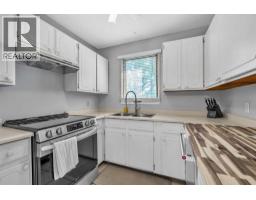2pc Bathroom - 215 Erin Woods Drive Se, Calgary, AB T2B2V7 Photo 9
