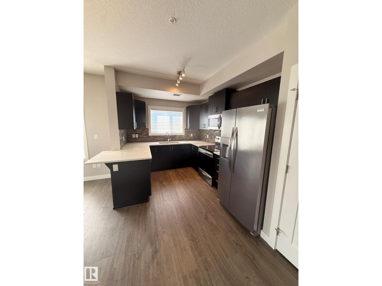 #306 560 GRIESBACH PARADE PR NW - 8