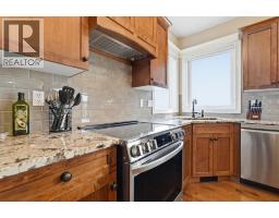 Living room - 505, 500 Carriage Lane Place, Carstairs, AB T0M0N0 Photo 8