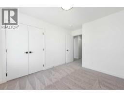 96 Heritage Manor, Cochrane, AB T4C3K8 Photo 26