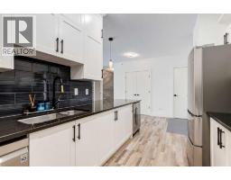 Kitchen - 407, 1899 45 Street Nw, Calgary, AB T3B4S3 Photo 8