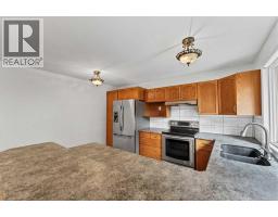 Family room - 642 Lakewood Road E, Brooks, AB T1R0L2 Photo 10