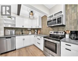 Laundry room - 1702, 11010 Bonaventure Drive Se, Calgary, AB T2J3A8 Photo 9