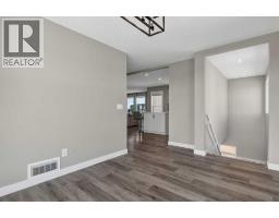 Family room - 354096 48 Street E, Okotoks, AB T1S1A7 Photo 10