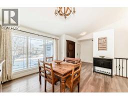 Family room - 145 Sunset Heights, Crossfield, AB T0M0S0 Photo 11