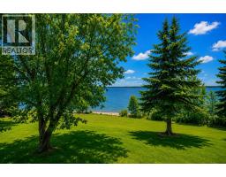 Family room - 1411 Juniper Road, Sunbreaker Cove, AB T0C0J0 Photo 8
