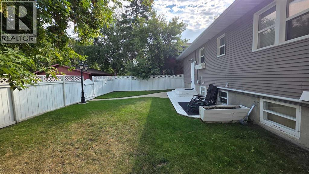 vinyl fenced rear yard