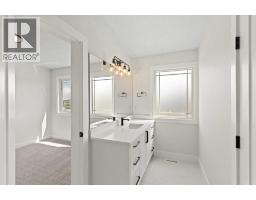 Family room - 87 Sundown Crescent, Cochrane, AB T4C1Y3 Photo 19