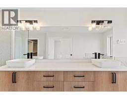 Laundry room - 87 Sundown Crescent, Cochrane, AB T4C1Y3 Photo 14