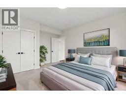 Bedroom - 87 Sundown Crescent, Cochrane, AB T4C1Y3 Photo 18