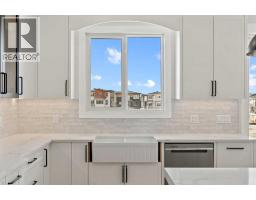 Pantry - 87 Sundown Crescent, Cochrane, AB T4C1Y3 Photo 7