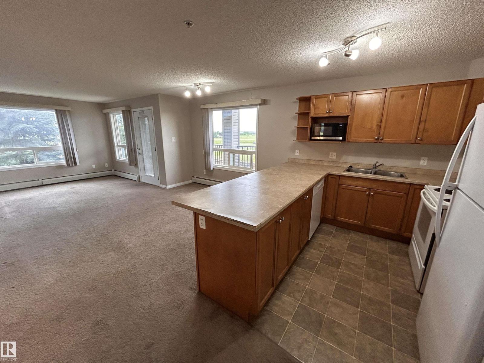 #6207 7331 SOUTH TERWILLEGAR DR NW - 24