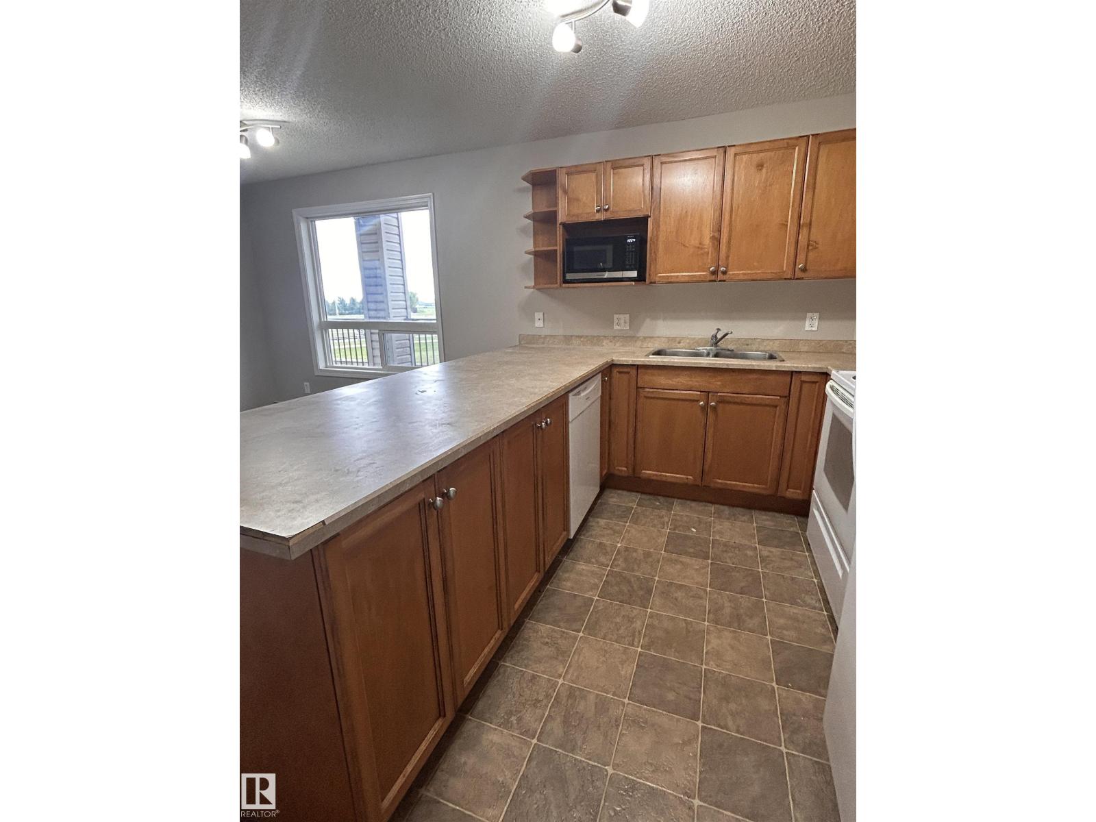 #6207 7331 SOUTH TERWILLEGAR DR NW - Image 51