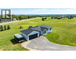 Living room - 108 Bruhn Boulevard, Rural Ponoka County, AB T0C2J0 Photo 9