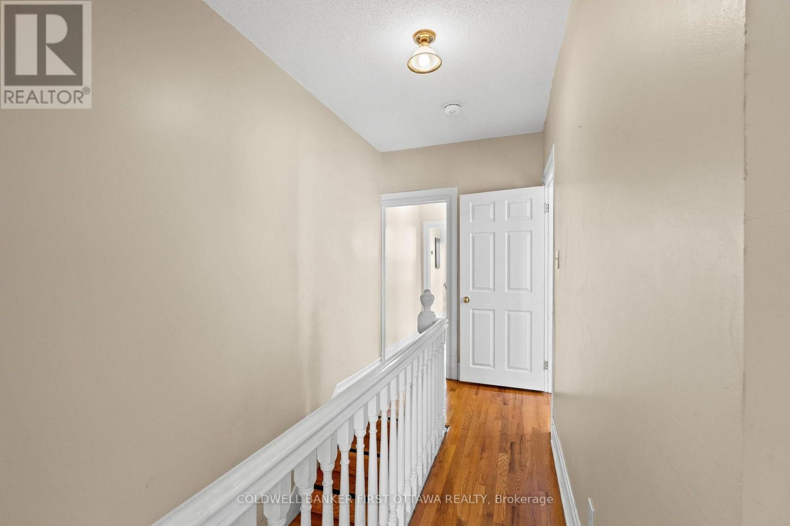 Hardwood flooring & high ceilings throughout.