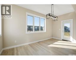 Family room - 435 Sharma Crescent, Saskatoon, SK S7W0Y4 Photo 12