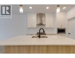 Great room - 1402 Bayview Crescent Sw, Airdrie, AB T4B5N9 Photo 9