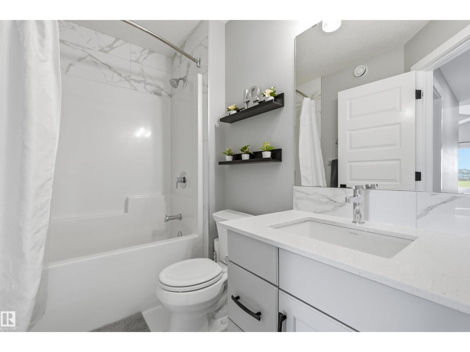 129 GLENRIDDING RAVINE RD SW - 32
