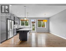 Family room - 14 Kingfisher Crescent Se, Airdrie, AB T4A0X5 Photo 9