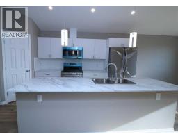 447 Henricks Drive, Irricana, AB T0M1B0 Photo 7