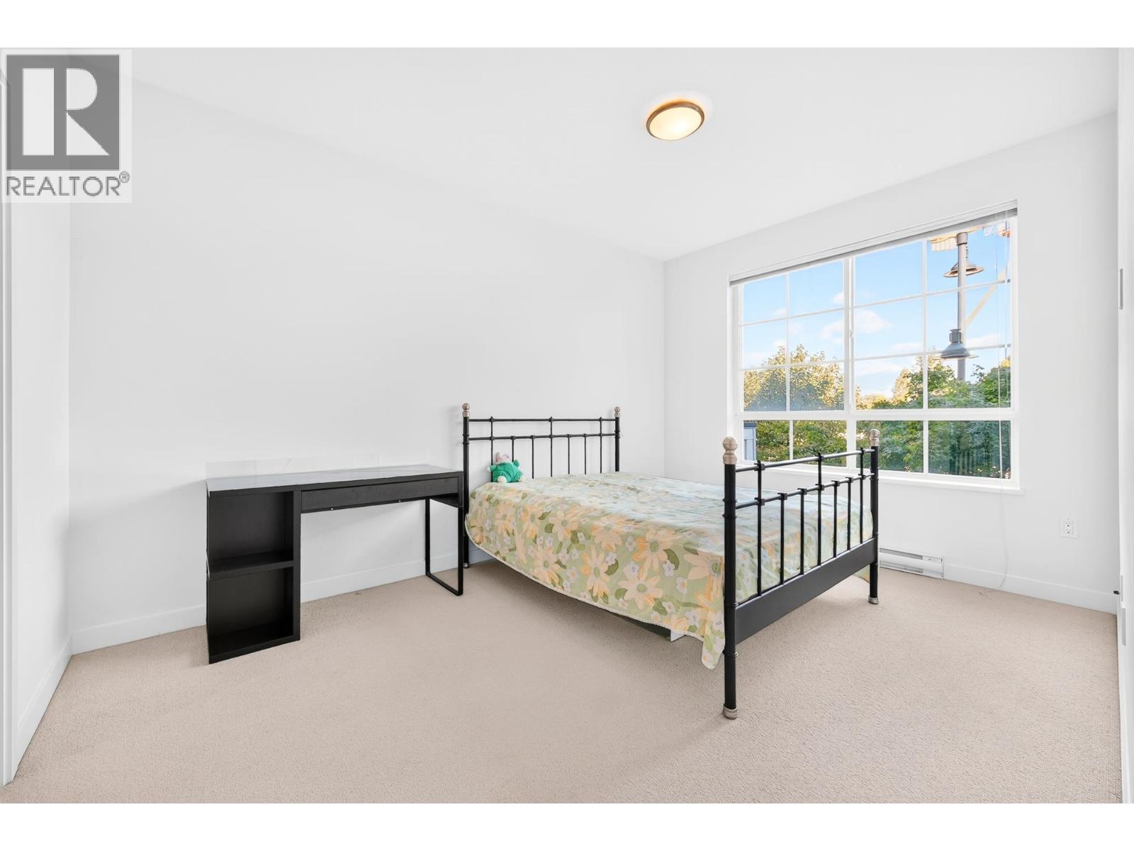 203 608 COMO LAKE AVENUE, Coquitlam