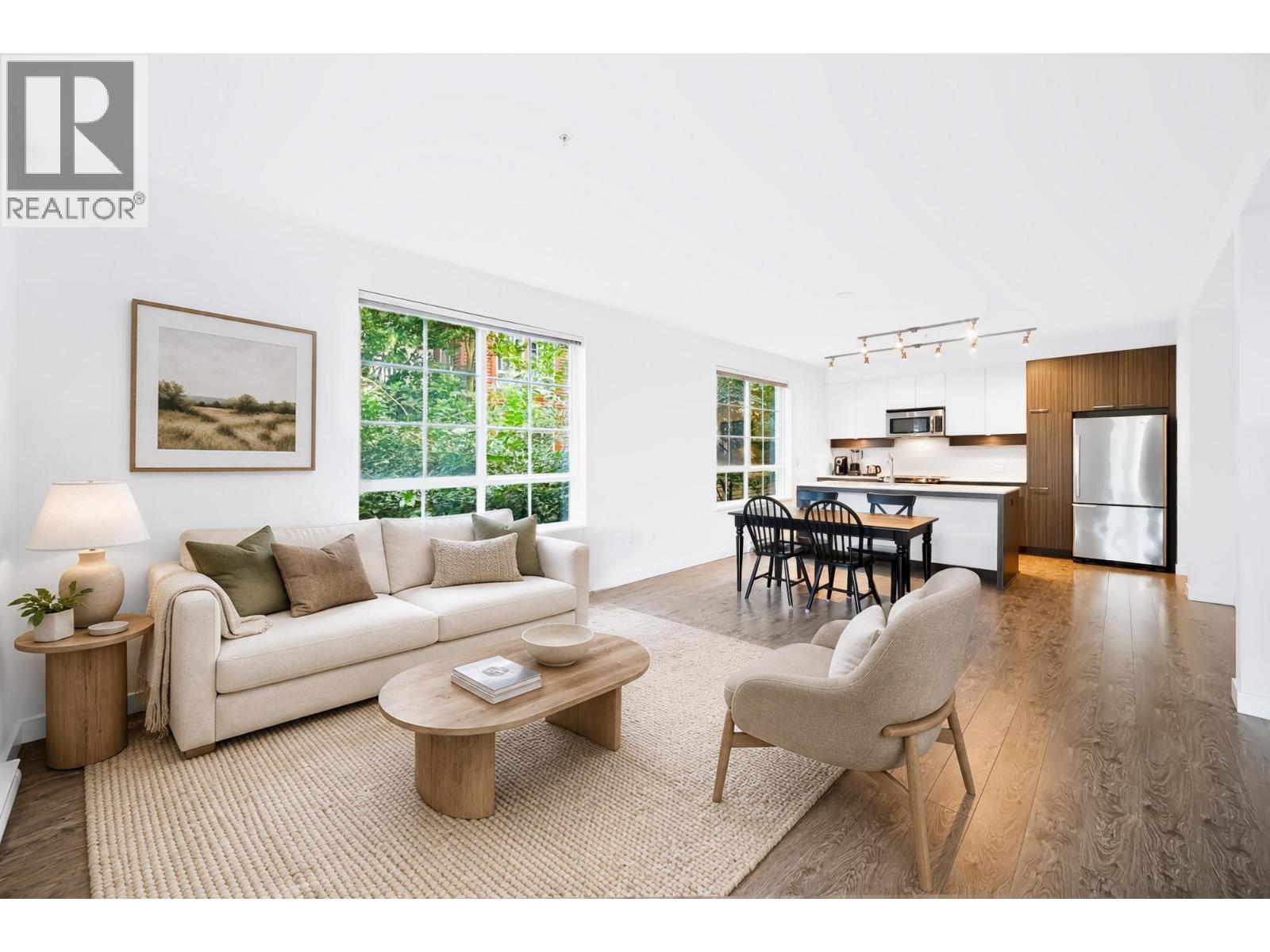 203 608 COMO LAKE AVENUE, Coquitlam