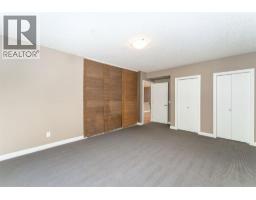 107, 106 Stewart Creek Landing, Canmore, AB T1W0G6 Photo 26