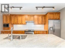 107, 106 Stewart Creek Landing, Canmore, AB T1W0G6 Photo 19
