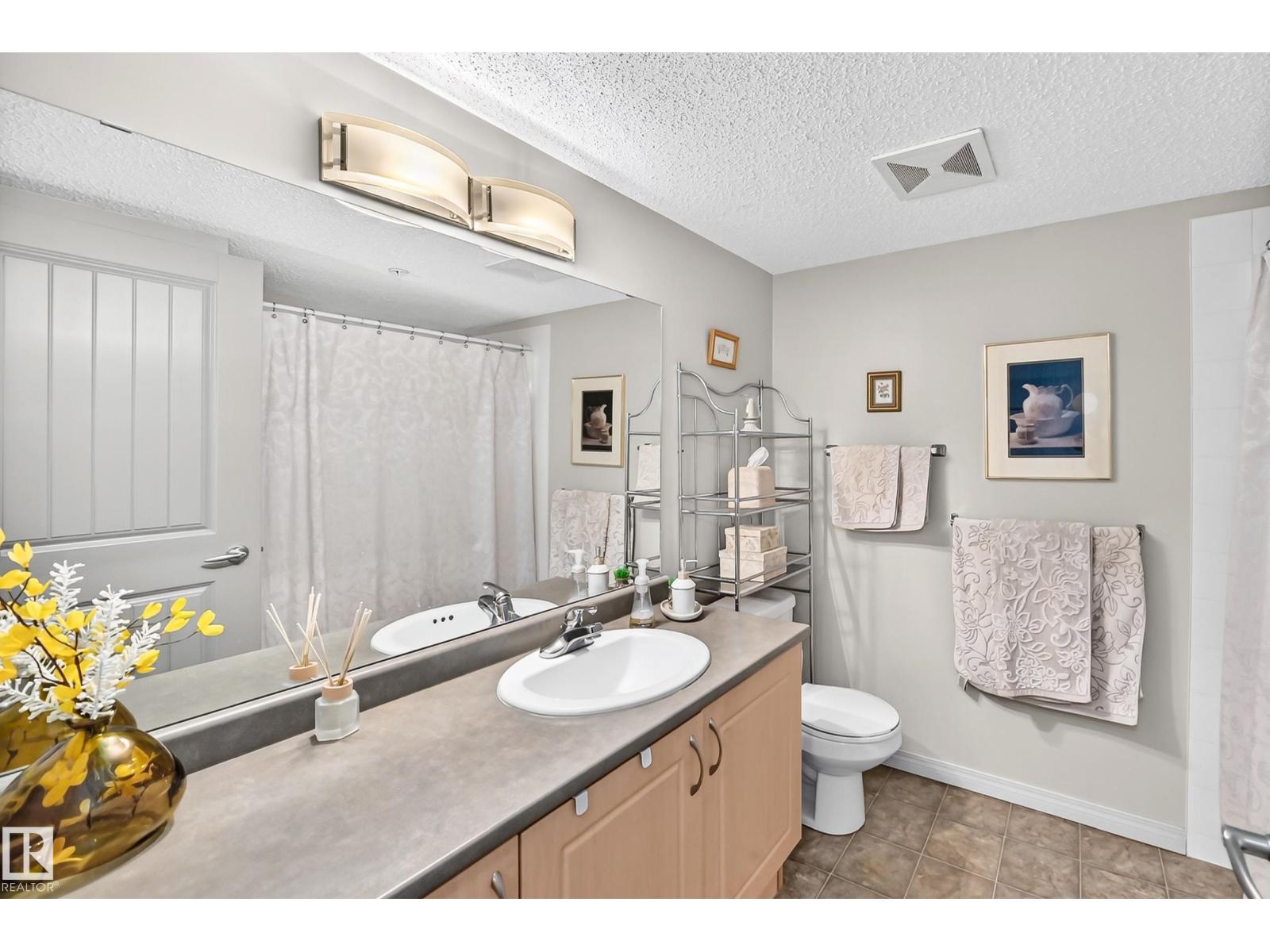 #418 13907 136 ST NW - 18