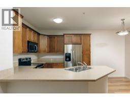 Kitchen - 1007 Harvey Avenue Unit# 208, Kelowna, BC V1Y6B1 Photo 7