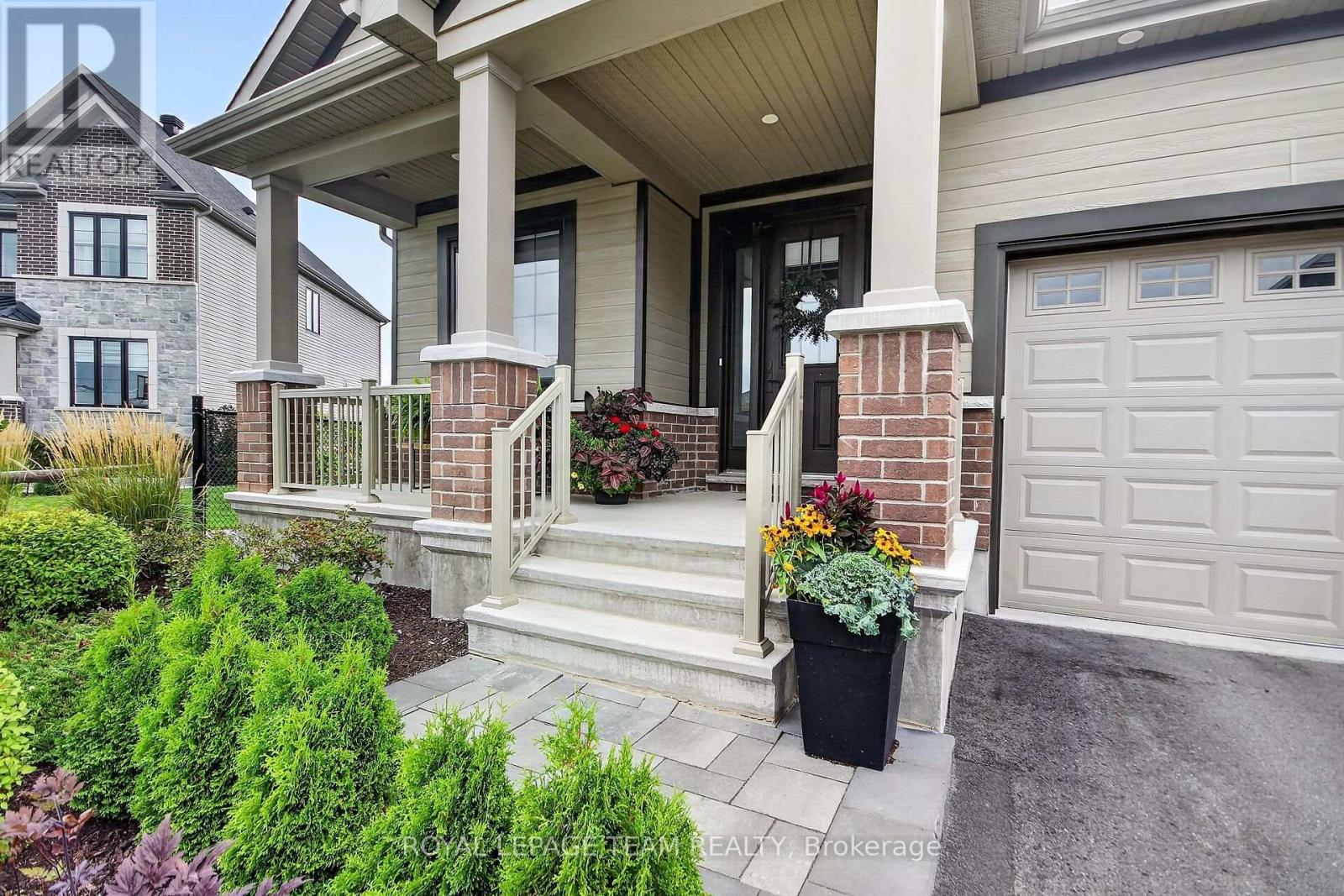 Inviting front porch with seating room for two