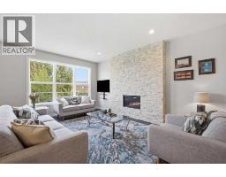 Family room - 190 Riviera View, Cochrane, AB T4C0Z1 Photo 10
