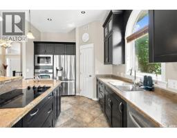 Laundry room - 715 Bellmont Court, Saskatoon, SK S7V1K7 Photo 8