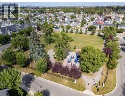 87 Couture Crescent Sw, Calgary, AB T3E7R3 Photo 47