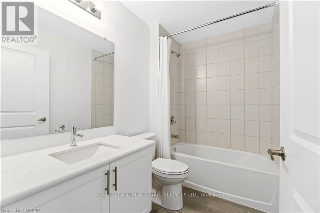 #605 5055 GREENLANE ROAD - 23