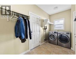 Den - 572 West Creek Point, Chestermere, AB T1X1T3 Photo 16