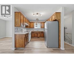 Kitchen - 228 Berwick Drive Nw, Calgary, AB T3K1P5 Photo 9