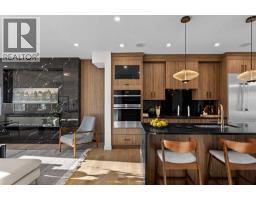 Living room - 105 Heritage Boulevard, Cochrane, AB T4C3G8 Photo 17