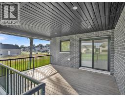 Living room/Fireplace - 54 Redwood, Cottam, ON N0R1B0 Photo 7