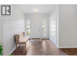 Primary bedroom of 109 6525 DOMANO BOULEVARD · Prince George, BC