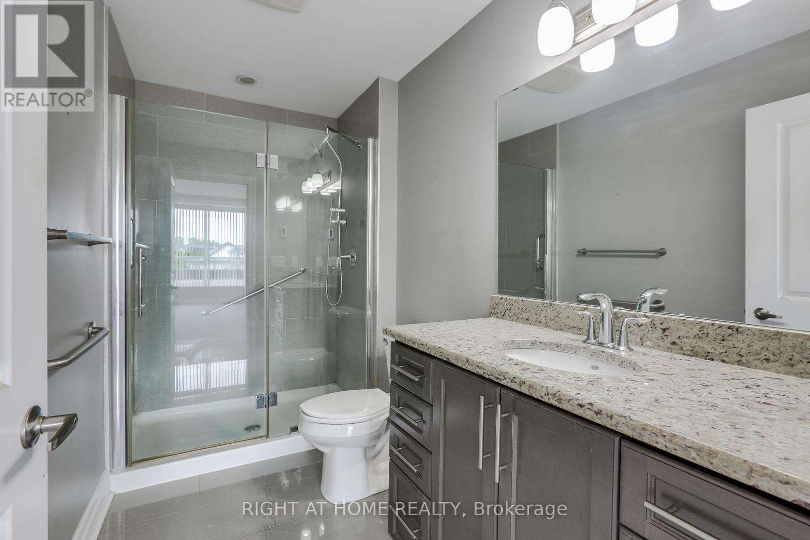 #212 240 VILLAGEWALK BOULEVARD - Image 23