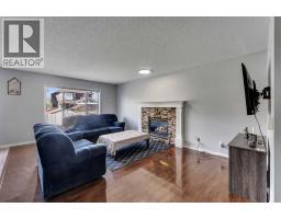 Living room - 153 Saddlemead Road Ne, Calgary, AB T3J4J3 Photo 6