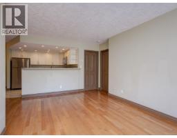 Living room - 205 930 Yates St, Victoria, BC V8V4Z3 Photo 6