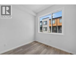 Bedroom - 405, 81 Midtown Boulevard Sw, Airdrie, AB T4B4E7 Photo 13