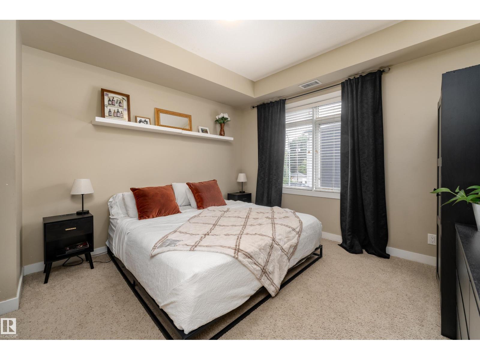 #204 9908 84 AV NW - Image 13