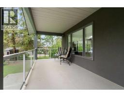 Family room - 202, 36214 Range Road 250, Rural Red Deer County, AB T0M1R0 Photo 6