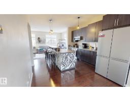 Bedroom 2 - #105 603 Watt Bv Sw, Edmonton, AB T6X0P3 Photo 6