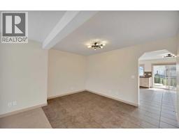 Living room - 130 Panamount Road Nw, Calgary, AB T3K0H6 Photo 12
