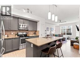 1217, 3727 Sage Hill Drive NW - photo 1