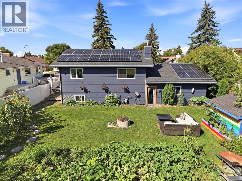 The oversized lot provides plenty of room for kids and pets to play, along with garden space and an included shed